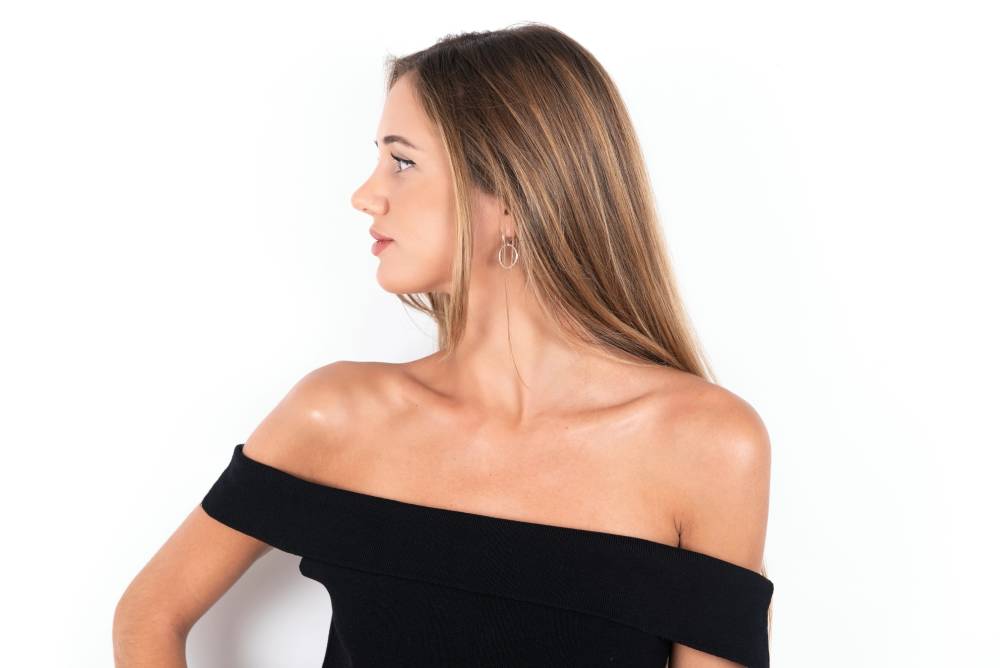 A profile shot of a woman after liquid rhinoplasty LIQUID RHINOPLASTY Surgeon Los Altos CA